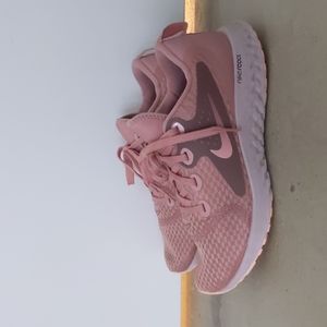 Pink Nike react shoes